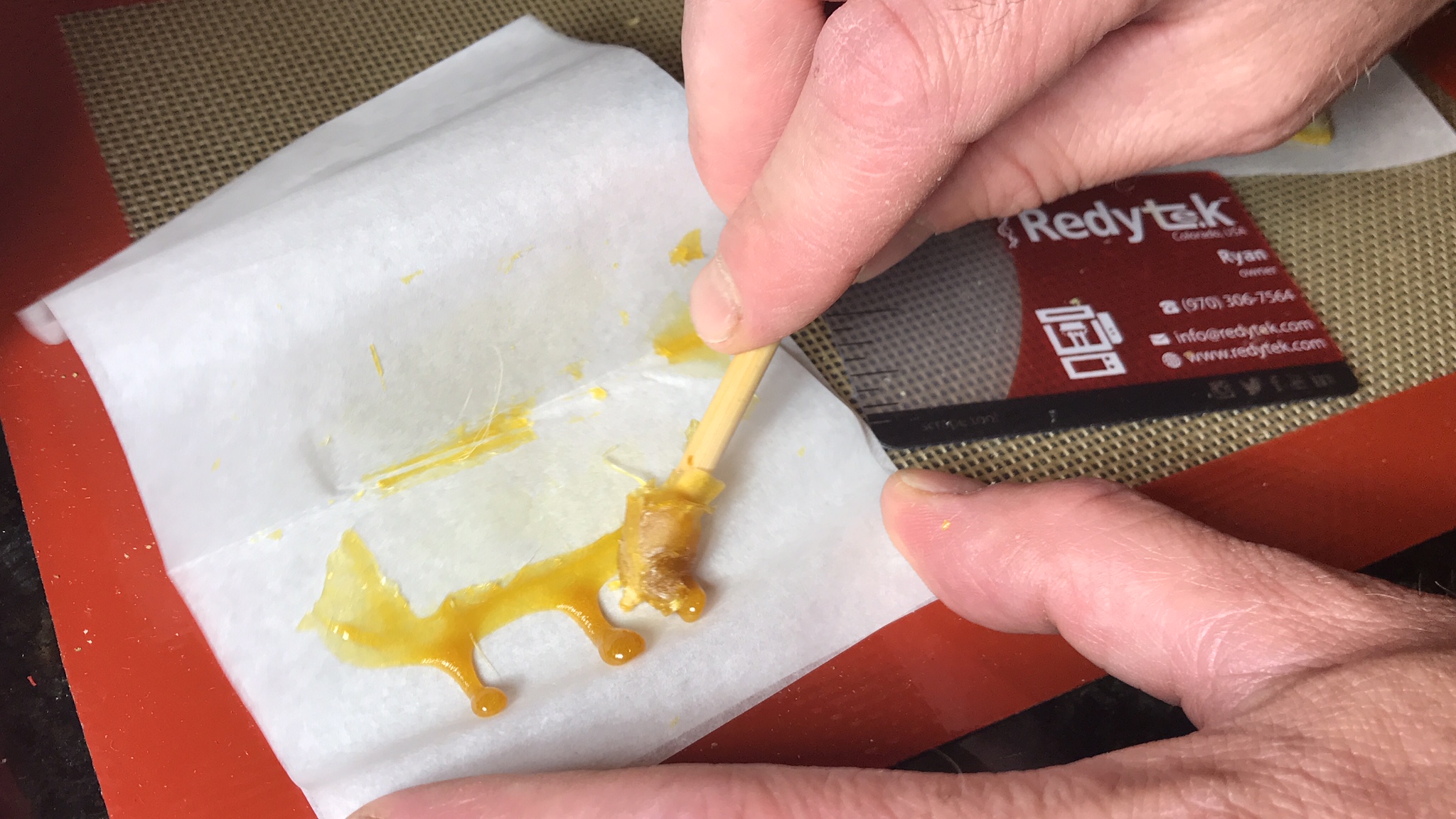 Rolling up freshly squished fresh frozen live rosin bubble hash produced on the Redytek R2P-X portable rosin press.