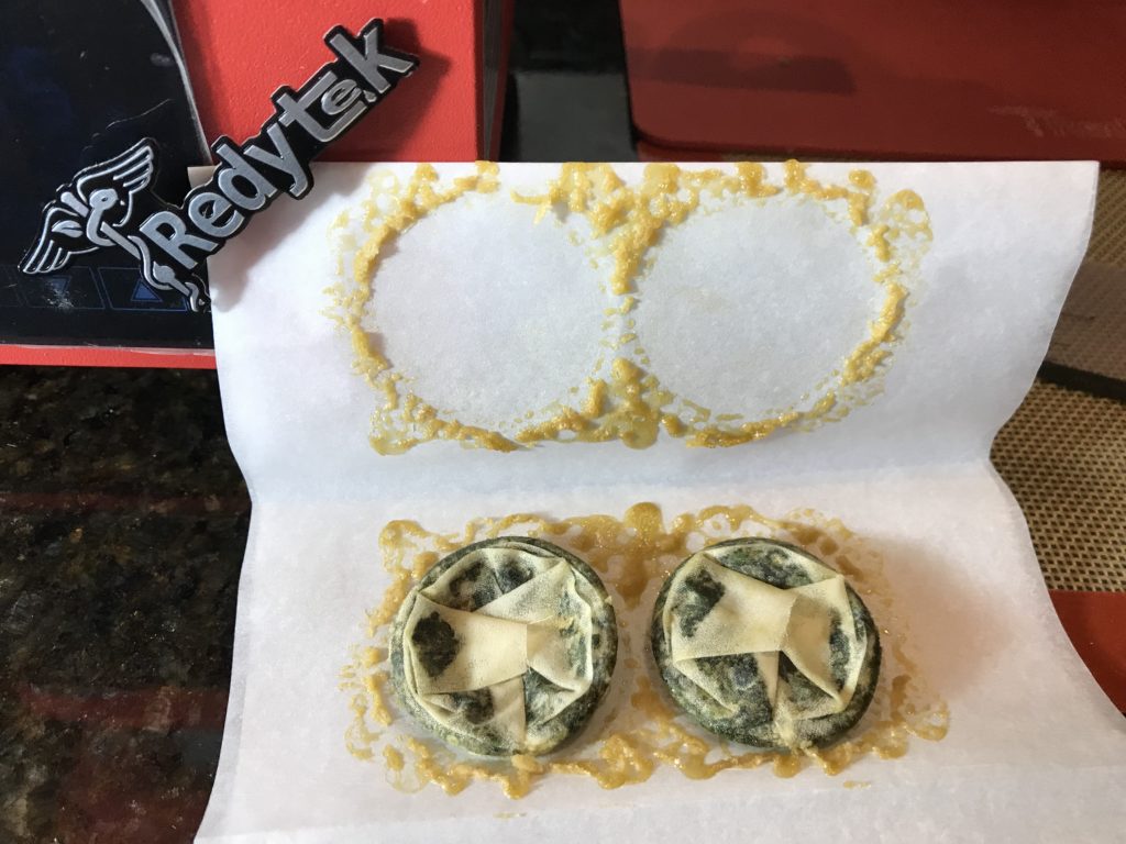 Turning Laughlin Dispensary flower into gold solventless concentrate using Rosin technique and Redytek rosin press Nevada