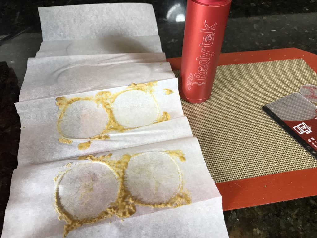 Turning Pauls Valley Dispensary flower into gold solventless concentrate using Rosin technique and Redytek rosin press Oklahoma