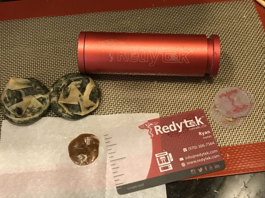 Turning Alma Dispensary flower into gold solventless concentrate using Rosin technique and Redytek rosin press Colorado