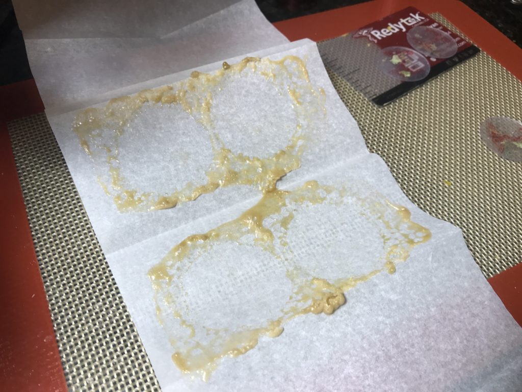 Turning Gold Bar Dispensary flower into gold solventless concentrate using Rosin technique and Redytek rosin press Washington