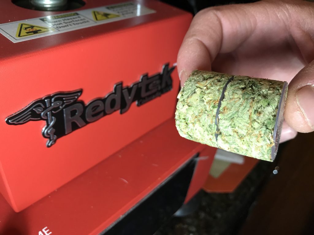 After obtaining Cathedral City dispensary flower, mold into a puck for highest returns using Redytek 30mm pre press mold